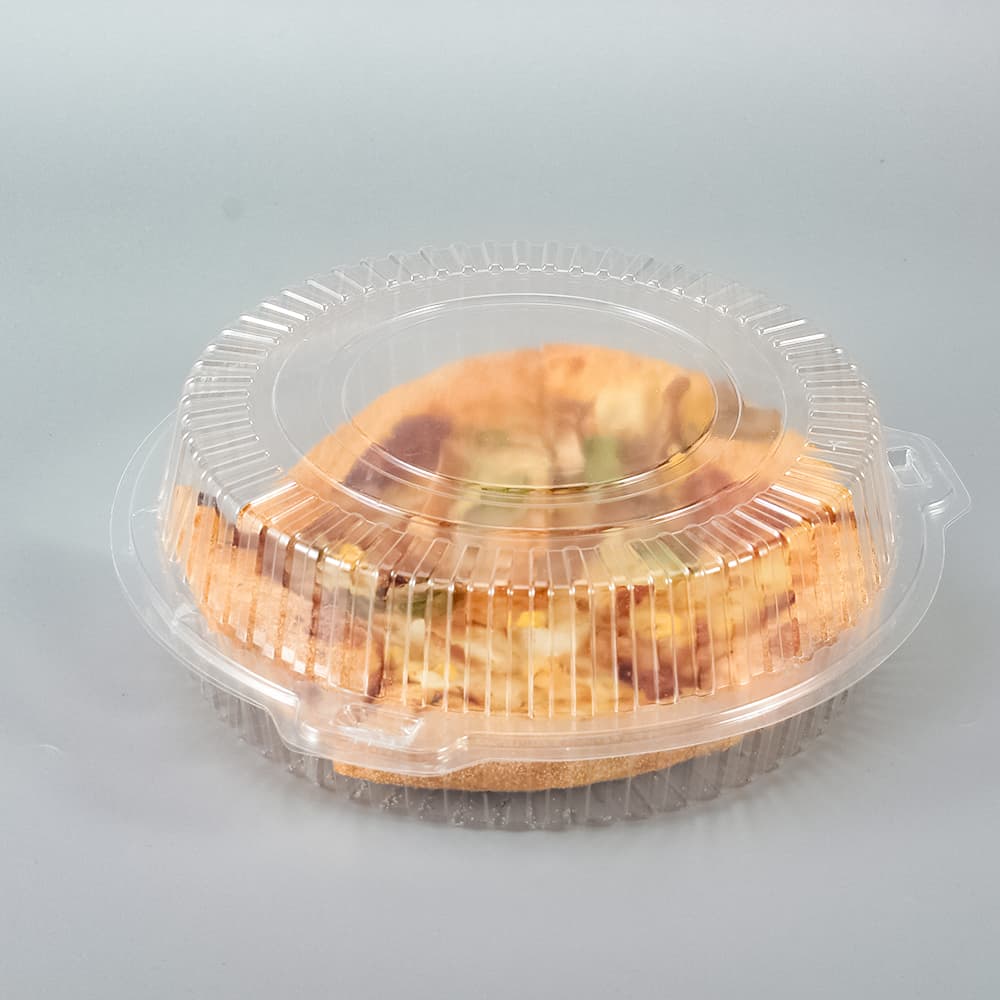 Closed round clear clamshell box with a pie inside