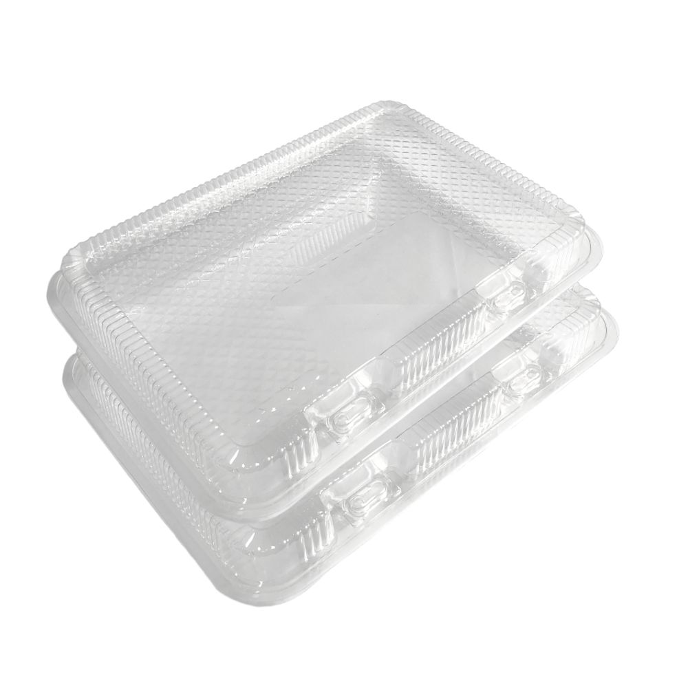 Two clear plastic clamshell containers with closed lids stacked together